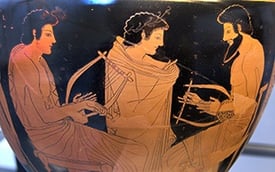 Ancient Greek pottery depicting music lesson